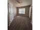 This bright bedroom has a ceiling fan, carpet, and lots of storage space at 1530 Villa Capri Cir # 302, Odessa, FL 33556