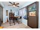 Bright dining area features a table for four, and a view of the backyard at 1823 Atrium Dr, Sun City Center, FL 33573