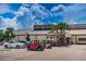 Exterior view of fitness center building with parking lot and vehicles at 1823 Atrium Dr, Sun City Center, FL 33573