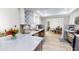 Spacious kitchen featuring stainless appliances, custom cabinets and plenty of room for entertaining at 1849 Del Robles Dr, Clearwater, FL 33764