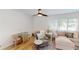 Cozy living room with hardwood floors and comfortable seating at 1849 Del Robles Dr, Clearwater, FL 33764