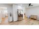 An additional pantry area features stainless fridge and modern custom cabinets at 1849 Del Robles Dr, Clearwater, FL 33764