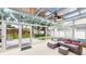 Bright sunroom with a comfortable lounge area and clear views of the outdoor space at 1849 Del Robles Dr, Clearwater, FL 33764