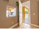 Open view from the entryway into the kitchen, showcasing modern appliances at 21012 Picasso Ct # 201, Land O Lakes, FL 34637