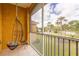 Inviting lanai with hanging chair offers a peaceful retreat with scenic views of the landscaped surroundings at 21012 Picasso Ct # 201, Land O Lakes, FL 34637