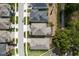 Aerial shot featuring modern homes, tree-lined streets, and neighborhood layout at 21590 Violet Periwinkle Dr, Land O Lakes, FL 34637
