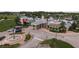 Stunning community clubhouse featuring colorful architecture, manicured landscaping, and convenient parking at 21590 Violet Periwinkle Dr, Land O Lakes, FL 34637