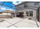 Enclosed patio features an outdoor seating area and furniture, perfect for outdoor dining and relaxing at 21590 Violet Periwinkle Dr, Land O Lakes, FL 34637