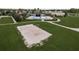 A sand volleyball court adjacent to the community pool provides outdoor recreation and fun for residents at 21590 Violet Periwinkle Dr, Land O Lakes, FL 34637
