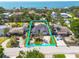 Expansive aerial view of a single-Gathering home with ocean view with well-maintained landscaping at 219 Miramar Ne Blvd, St Petersburg, FL 33704