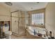 Bathroom showing shower, tub, and window, ready for personalized renovation and updates at 219 Miramar Ne Blvd, St Petersburg, FL 33704