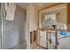 Bathroom view with shower, exposed framing, and a view of the adjacent room and renovation at 219 Miramar Ne Blvd, St Petersburg, FL 33704
