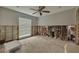 Bedroom with exposed framing and a large window providing natural light at 219 Miramar Ne Blvd, St Petersburg, FL 33704