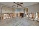 Bedroom showcasing exposed wall framing, doorway views, and flooring undergoing renovation at 219 Miramar Ne Blvd, St Petersburg, FL 33704