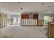 Open-concept kitchen awaiting renovation, featuring cabinetry and a convenient door to the outdoor area at 219 Miramar Ne Blvd, St Petersburg, FL 33704