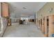 Open living space with a partially framed area for future kitchen, ready for custom renovation at 219 Miramar Ne Blvd, St Petersburg, FL 33704