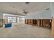 Renovations needed. Unfinished living room with patio access to the pool at 219 Miramar Ne Blvd, St Petersburg, FL 33704