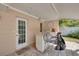 Covered patio with a bar area, perfect for outdoor entertaining by the pool at 219 Miramar Ne Blvd, St Petersburg, FL 33704