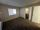 Bedroom with window and closet with folding doors at 229 Mary Dr # 229, Oldsmar, FL 34677