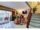 Cozy dining area adjacent to the staircase and with patio access at 2600 Forest Run Ct, Clearwater, FL 33761