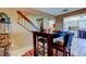View of dining area, staircase, and a glimpse of the kitchen at 2600 Forest Run Ct, Clearwater, FL 33761