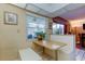 Eat-in kitchen featuring a breakfast nook, window views, and tiled flooring at 2600 Forest Run Ct, Clearwater, FL 33761
