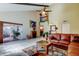 Spacious living room with fireplace and access to a screened-in patio at 2600 Forest Run Ct, Clearwater, FL 33761