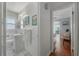 Neutral bathroom with window and ensuite access to bedroom at 2613 Upton S St, Gulfport, FL 33711