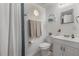 Bright bathroom featuring a vanity sink, modern fixtures, and stylish decor elements at 2613 Upton S St, Gulfport, FL 33711
