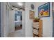 Hallway view of updated bathroom with stylish decor and easy bedroom access at 2613 Upton S St, Gulfport, FL 33711