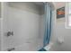 Clean white bathtub with modern fixtures and white tile surround at 2613 Upton S St, Gulfport, FL 33711