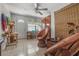 Inviting entryway with tiled floor, comfortable wicker seating, and natural light, creating a cozy and welcoming atmosphere at 2613 Upton S St, Gulfport, FL 33711