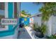 Unique, reserved, exterior space featuring a sun design, a grill, and privacy fencing at 2613 Upton S St, Gulfport, FL 33711