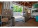 The garage boasts an outdoor living space, adding additional entertainment area and a stainless steel refrigerator at 2613 Upton S St, Gulfport, FL 33711