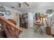 Unique living area with eclectic decor, tile floors, and vintage elements creating a distinctive ambiance at 2613 Upton S St, Gulfport, FL 33711