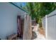 The backyard features an outdoor shower, tropical landscaping, and a private setting at 2613 Upton S St, Gulfport, FL 33711