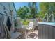 Cozy patio with a hot tub, stylish furniture, and tasteful decor creating an inviting outdoor living space at 2613 Upton S St, Gulfport, FL 33711