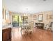 Bright dining room with large window, stylish chandelier, and well-appointed furnishings for comfortable dining at 3309 Westmoreland Dr, Tampa, FL 33618