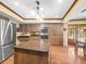 Updated kitchen featuring an island, stainless steel appliances, and ample cabinet space at 3309 Westmoreland Dr, Tampa, FL 33618