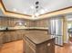 Bright kitchen with island, stainless appliances and plenty of cabinet space at 3309 Westmoreland Dr, Tampa, FL 33618