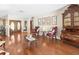 Inviting living room featuring hardwood floors, elegant decor, and a cozy seating arrangement with decorative furniture at 3309 Westmoreland Dr, Tampa, FL 33618