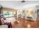 Elegant living room with hardwood floors and views of the pool at 3309 Westmoreland Dr, Tampa, FL 33618