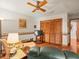 Cozy living room featuring hardwood floors, ceiling fan, and decorative duck border at 3309 Westmoreland Dr, Tampa, FL 33618