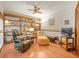 Cozy living room with built-in bookshelves, comfortable seating, and a relaxing atmosphere for reading or watching TV at 3309 Westmoreland Dr, Tampa, FL 33618
