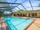 Outdoor pool area complete with bar and ample seating, perfect for entertaining and relaxing at 3309 Westmoreland Dr, Tampa, FL 33618