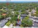 An aerial view highlighting the neighborhood's lush greenery and proximity to Swann Park at 4309 W Robin Ln, Tampa, FL 33609