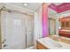 Cozy bathroom with shower-tub and vanity cabinet at 4309 W Robin Ln, Tampa, FL 33609