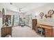 Bright bedroom with a ceiling fan, a window and a desk at 4309 W Robin Ln, Tampa, FL 33609