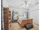 Bedroom with built-in bookcase and natural light at 4309 W Robin Ln, Tampa, FL 33609