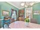 Inviting dining room features charming decor, natural light, and a built-in china cabinet at 4309 W Robin Ln, Tampa, FL 33609